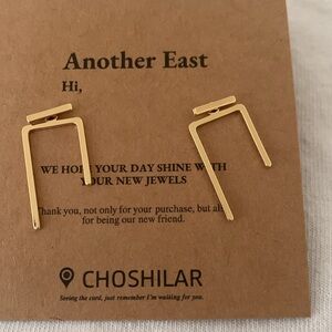 NWT Assymetrical Gold Earrings